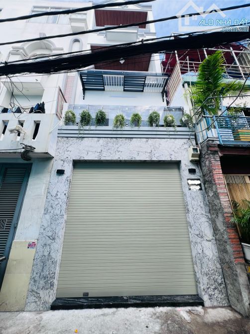 NHÀ 4 TẦNG HẺM XE HƠI THÔNG NGUYỄN VĂN LINH - TÂN THUẬN NHỈNH 7ty TL - 6