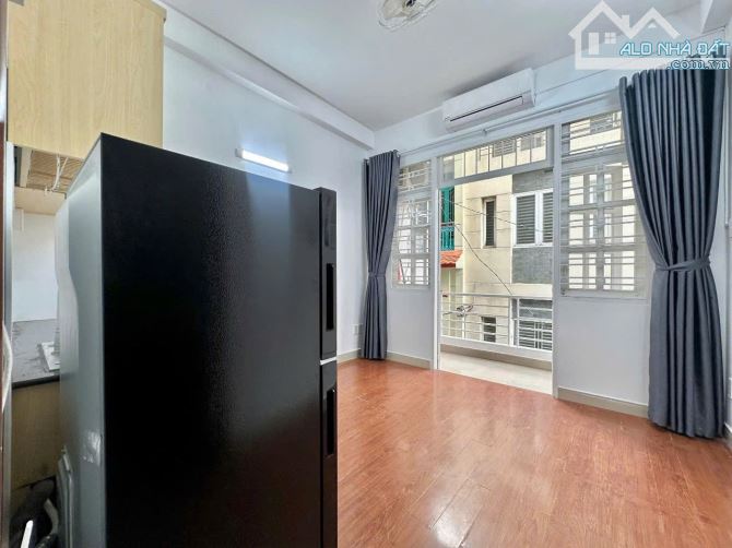 Bán CHDV Quận 5 - Hẻm xe hơi - 5 tầng - 7 phòng - thu nhập 360tr/năm - 7