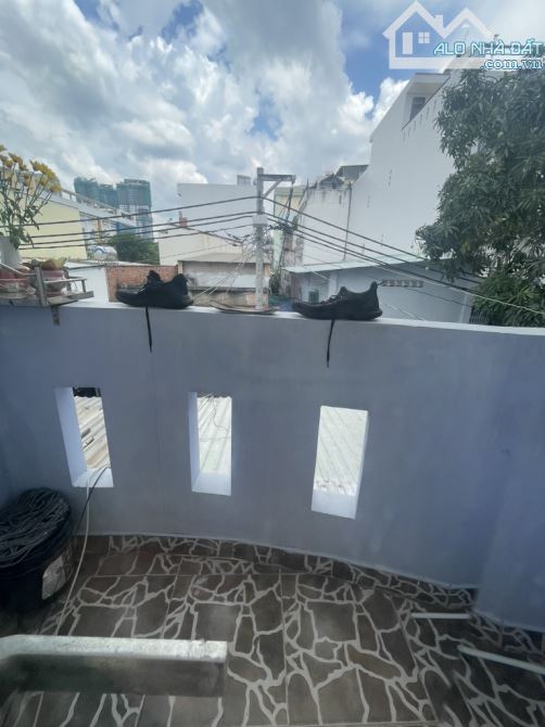 PHÚ THUẬN.QUẬN 7 ĐƯỜNG 6M :OTO ĐỔ CỬA NHÀ  DT :5 X 10m NHÀ XÂY KIÊN CỐ : BTCT T