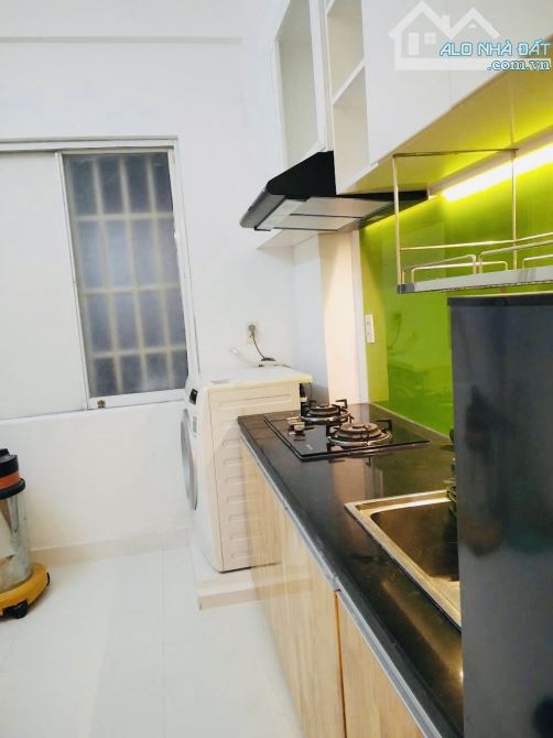 GÕ CỬA KÈO THƠM CC SỐ 1 TÔN THẤT  THUYẾT - VỊ TRÍ Ở NGAY BẾN VÂN ĐỒN GIÁP QUẬN 1 HIỆN TẠI - 14
