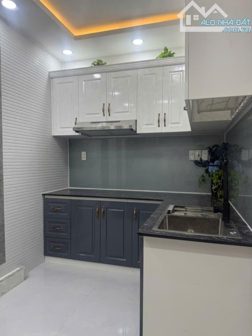 ĐƯỜNG NGUYỄN VĂN QUỲ  HẺM OTO  4M  DT 6,5 X 17  NHÀ. 2 TẦNG ,ĐANG CHO THUÊ KINH DOANH TẬP - 2