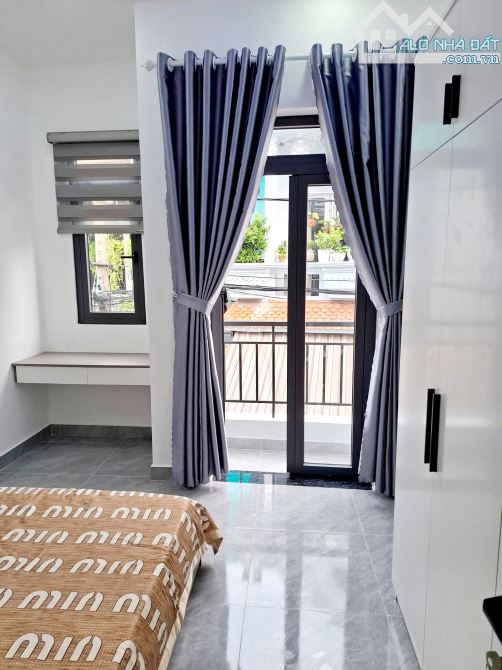 Nhà Gò Vấp ngang khủng 4m6 3 tầng 3 phòng ngủ hẻm 4m giá 3 tỷ 25 ở Quang Trung Phường 8 - 3