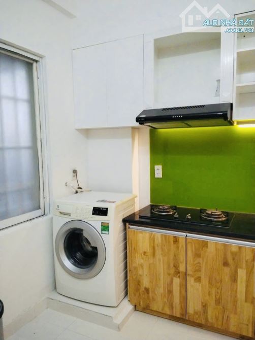 GÕ CỬA KÈO THƠM CC SỐ 1 TÔN THẤT  THUYẾT - VỊ TRÍ Ở NGAY BẾN VÂN ĐỒN GIÁP QUẬN 1 HIỆN TẠI - 6
