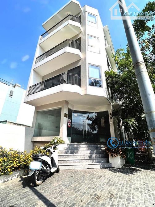 Cho thuê nhà mặt tiền KD-VP An Phú ,Quận_2 Hầm 4 Tầng,thang máy