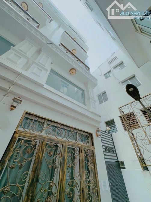 Bán nhà KDC đồng bộ cao tầng HXH Phan Đăng Lưu, P7, DT 4x10m, 5 lầu, 4PN, giá 7.7 tỷ TL