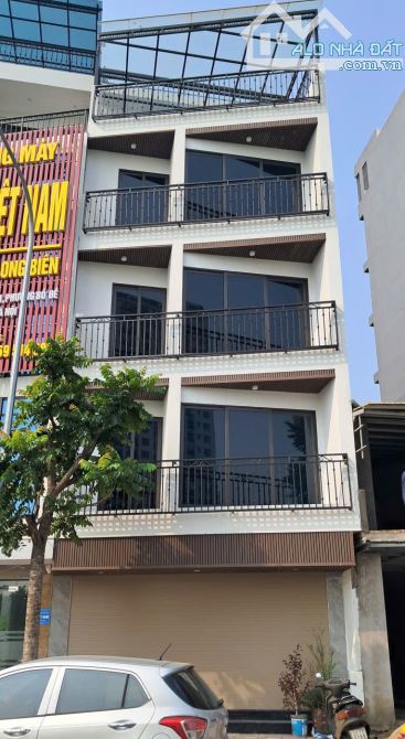 CHO THUÊ NHÀ ĐƯỜNG HỒNG TIẾN, PHƯỜNG BỒ ĐỀ, 100M2 x 6 TẦNG THANG MÁY