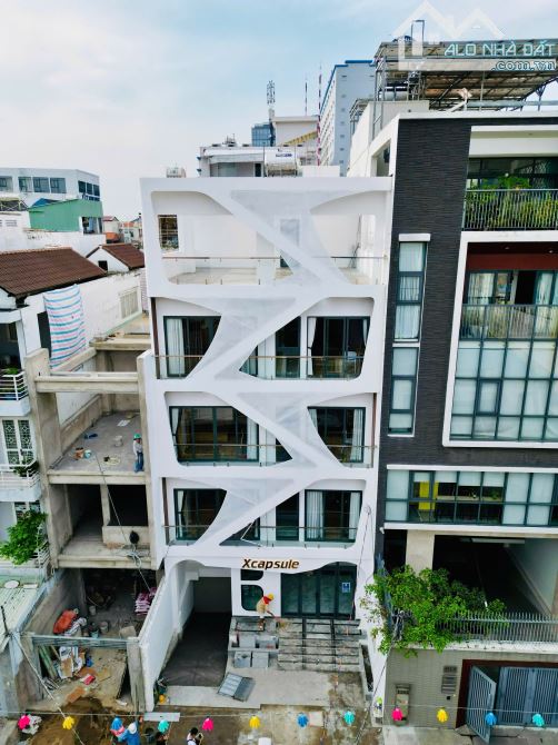 Tòa nhà 23 căn hộ dịch vụ cao cấp + MBKD. Hầm + 5 tầng.Nguyễn Gia Trí, P.25, Bình Thạnh