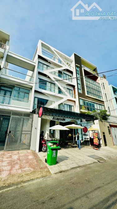 Tòa nhà 23 căn hộ dịch vụ cao cấp + MBKD. Hầm + 5 tầng.Nguyễn Gia Trí, P.25, Bình Thạnh - 1