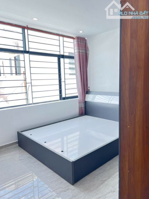 Bán nhà mới 1 trệt 3 lầu hẻm oto Trương Công Định, p8 - 1