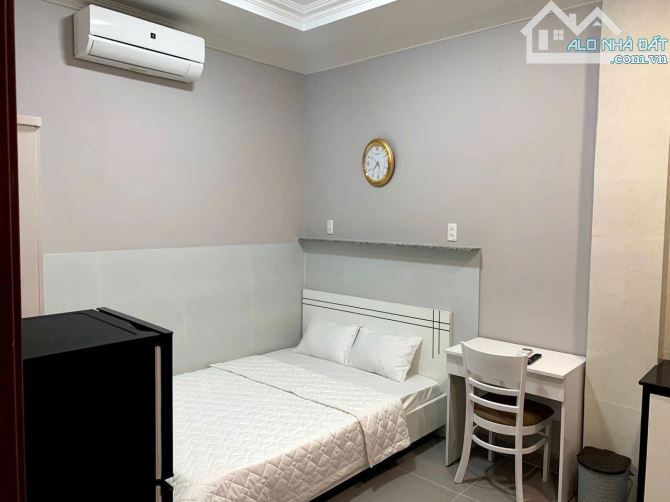 Tòa nhà CHDV mặt tiền 6.2m x 30m,có hầm, thang máy,thu nhập 170 triệu/tháng giảm còn 45 tỷ - 2