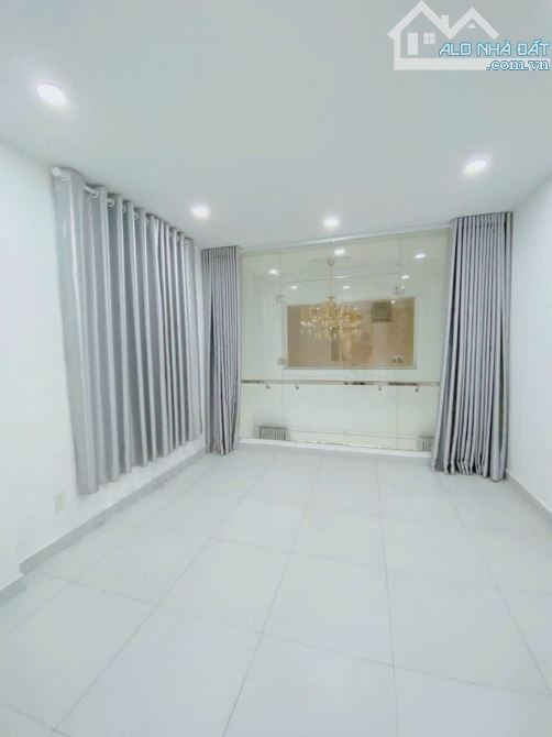 Bán nhà KDC đồng bộ cao tầng HXH Phan Đăng Lưu, P7, DT 4x10m, 5 lầu, 4PN, giá 7.7 tỷ TL - 8