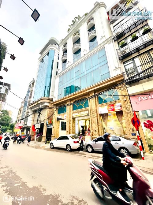 Building mặt phố Vương Thừa Vũ, DT 1.5 tỷ/năm, vỉa hè, gara, 104m*9T thang máy