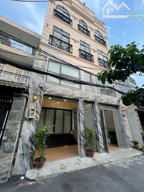 Tòa nhà ngay ngã 4 Lê Hồng Phong - Trần Phú,Q.5 - 8x18m(CN:150m2)6 tầng,thang máy - 32 tỷ