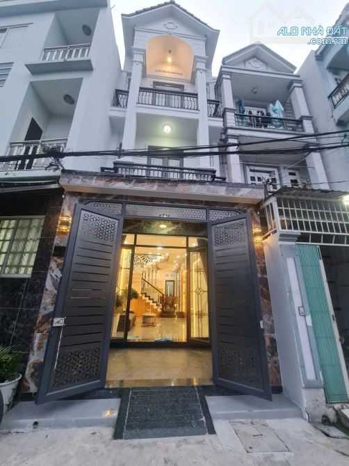Bán nhà 1 xẹt Thới An 04, đường rộng 5m, (4x15,5) đúc trệt, 2 lầu, 4PN,  Q12 - 11