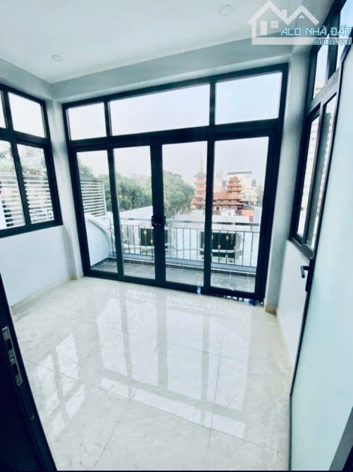 TOÀ NHÀ 5 TẦNG -THANG MÁY - THU NHẬP ỔN 80 TRIỆU/THÁNG -VỊ TRÍ ĐẸP- QUẬN 4 - 1