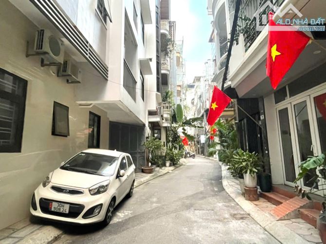 BÁN NHÀ PHÂN LÔ 26 TỶ 70m 5 TẦNG MT 5,6m VỈA HÈ Ô TÔ TRÁNH KINH DOANH NGUYÊN HỒNG ĐỐNG ĐA - 1