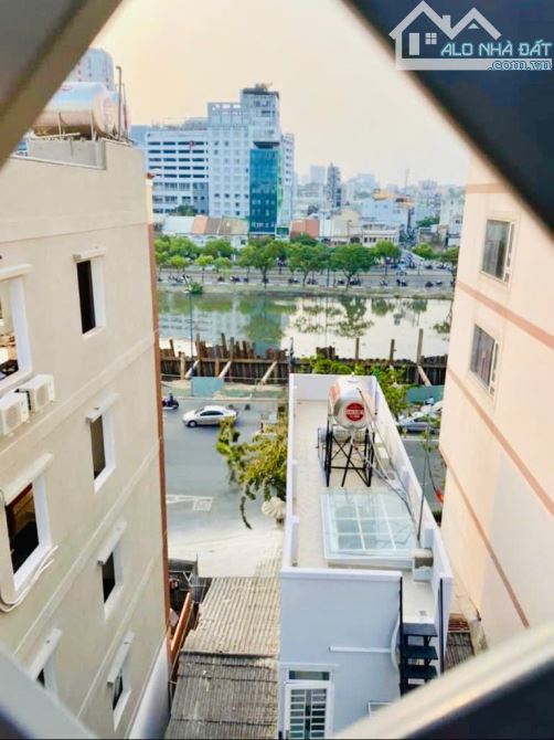 TOÀ NHÀ 5 TẦNG -THANG MÁY - THU NHẬP ỔN 80 TRIỆU/THÁNG -VỊ TRÍ ĐẸP- QUẬN 4 - 3