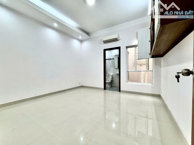 Gần chợ Bà Chiểu! HXH 5m trải nhựa sát MT Lê Quang Định - 4.8x12m nở hậu - 5tầng - 4PN. - 4