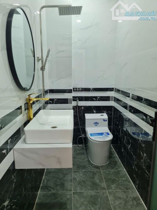Bán nhà 1 xẹt Thới An 04, đường rộng 5m, (4x15,5) đúc trệt, 2 lầu, 4PN,  Q12 - 5