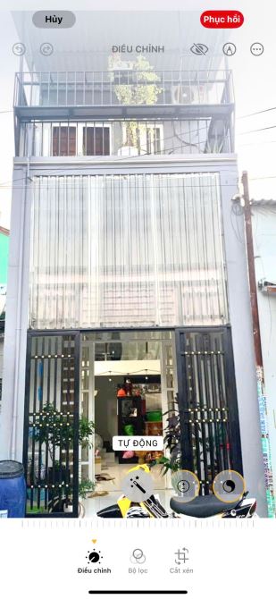 Bán nhà lầu triệt  mặt tiền đường  nhựa 6m kinh doanh dĩ an gân trường học - 1