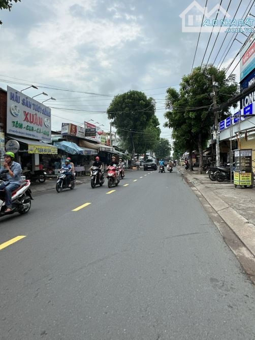 Nhỉnh 12 tỷ sở hữu MTKD sầm uất Nguyễn Văn Quá 100m2 ngang 4.1m 4 lầu gần chợ Cây Sộp. - 1