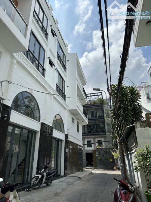 bán nhà hẻm 5 nơ trang Long, phường 7, Quận Bình Thạnh, DT:9x5m.4 tầng .Giá :8.3 tỷ (TL) - 4
