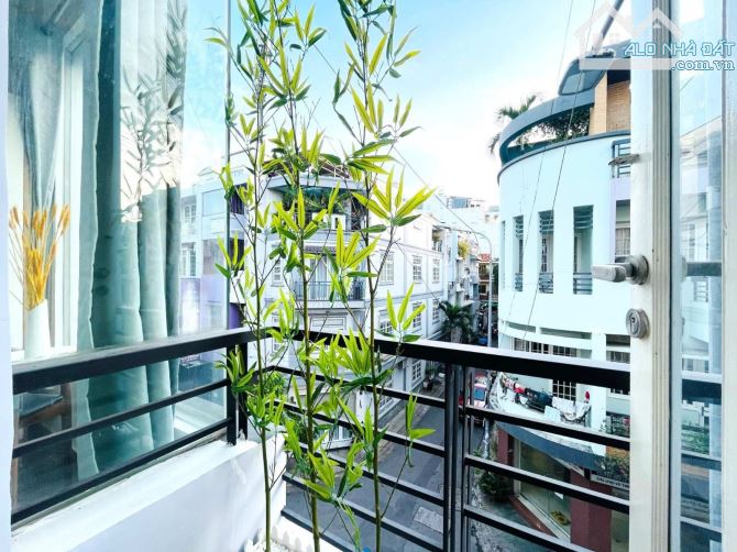 Bán gấp CHDV khu Phan Đăng Lưu, Phú Nhuận (5.5x23m) Hầm 5 tầng - HĐT 85Tr - Giá bán 23 tỷ - 9