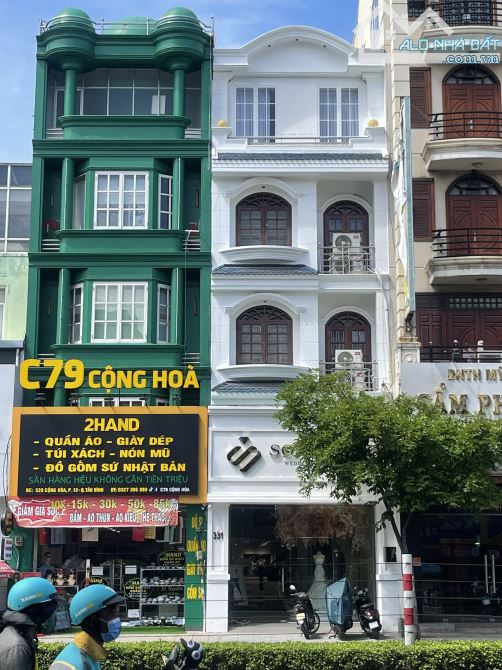 Tòa nhà văn phòng Lý Thường Kiệt - Đất Thánh F6 Q. Tân Bình, DT: 6x25m hầm 5 tầng 37.5 tỷ