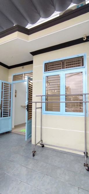 NHÀ TRỆT LỬNG 50M2. HXH MỘT TRỤC THẲNG. GẦN NGÃ TƯ BÙI CÔNG TRỪNG GIAO ĐẶNG THÚC VỊNH. - 1