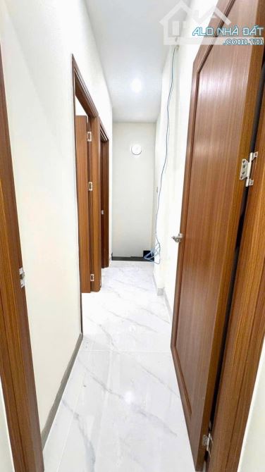 NHÀ LÔ GÓC 2 TẦNG MẶT TIỀN ĐƯỜNG NHỰA TRẦN THỊ DO (12M) phường Hiệp Thành quận 12 dt74m2 - 3