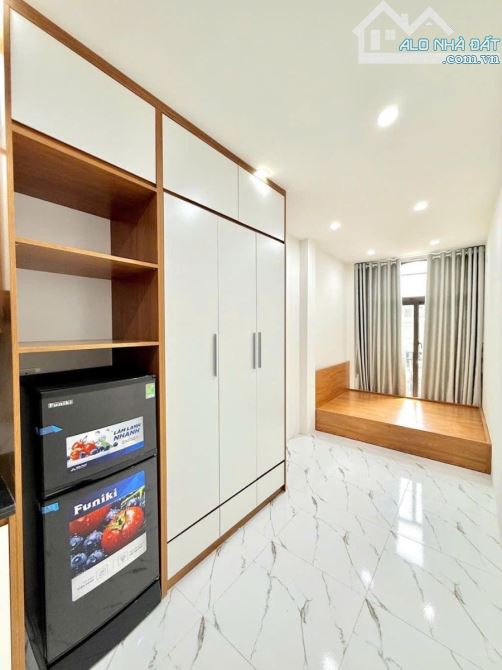 Tòa CCMN Giáp Bát - Hoàng Mai 61m2, 6T, gần ô tô, 14 phòng kk, DT 800tr/năm, giá 16 tỷ - 3
