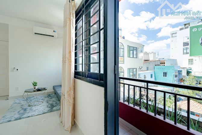 Studio ban công lớn - full nội thất - máy giặt riêng - tách bếp ngay chân cầu Nguyễn Vă - 2