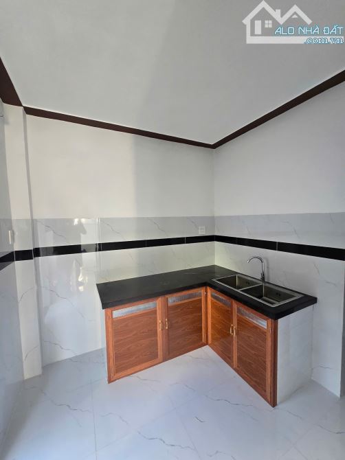 Bán nhà hẻm Trần Hưng Đạo, gần chợ Hoa Lư. Nhà sau mặt tiền hẻm 1 căn - 3