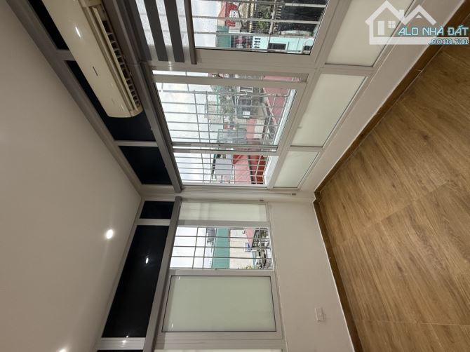 Bán nhà Thịnh Hào ngõ thông gần phố nhà đẹp 2  thoáng ở ngay 47m 7 tầng nở hậu giá 11.8 tỷ