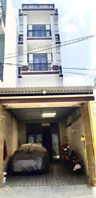 Bán nhà hxh 1 sẹc đường Làng Tăng Phú gần Lê Văn Việt 4 tầng 97m2 giá 7.3 tỷ