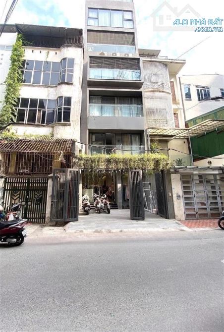 Nhà đẹp Hoàng Cầu Đống Đa 90m2 6Tầng MT5.5m-Gần Hồ Nhà Mới Thang Máy Ô Tô Tránh Kinh Doanh
