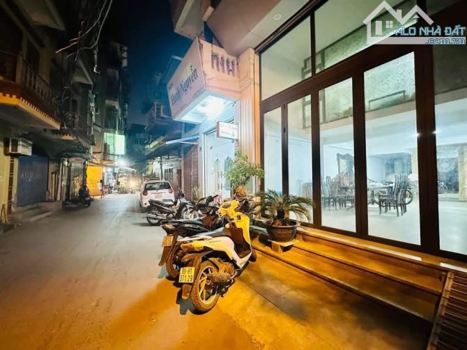 Nhà đẹp Tôn Đức Thắng quận Đống Đa 64m2 7Tầng MT5.5m-Ô Tô Tránh Thang Máy-10m Ra Hồ