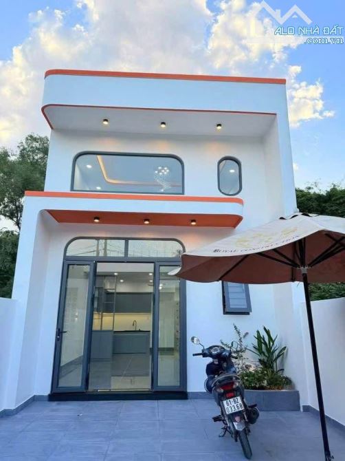 Nhà gác lửng ngay gần cổng chào Vĩnh Cửu Gía 1ty750 bao sổ thuế phí ,sổ riêng , full thổ