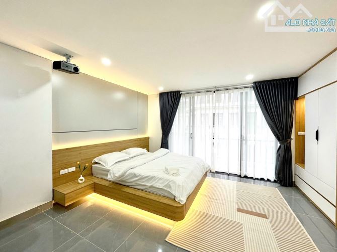 Bán toà CHDV 68m2*6T thang máy 10PN gần ĐH KTQD mặt tiền 10M, oto, PCCC, thông tứ tung - 1
