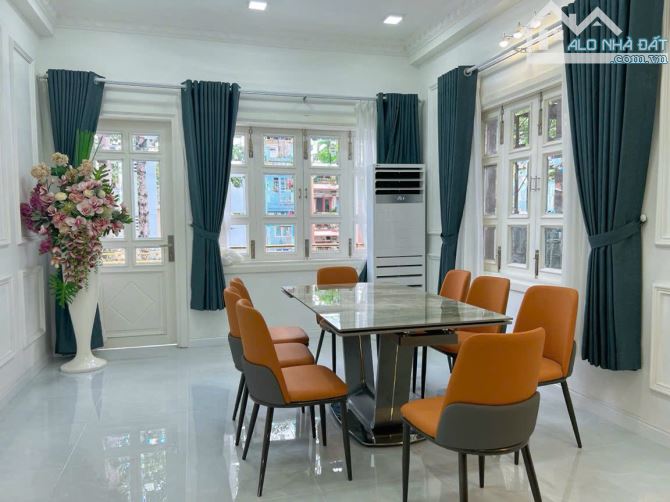 Cho thuê nhà 239 Ngô Gia Tự gần Sư Vạn Hạnh (DT: 4x16m, 4 lầu) quận 10 giá 66tr - 1