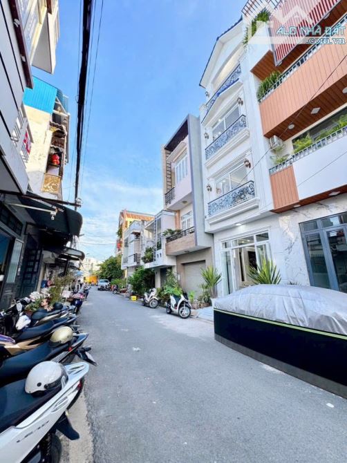 nhà mặt tiền nguyễn văn trỗi, 1 trệt 3 lầu sang trọng, giá bán 4 tỷ 990 triệu - 1