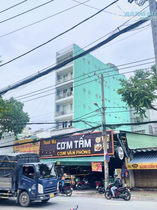 Bán tòa nhà CHDV 8 tầng mặt tiền Lê Văn Thọ, P.8, Gò Vấp dòng tiền 100tr/th 180m2 - Giá 31 - 1