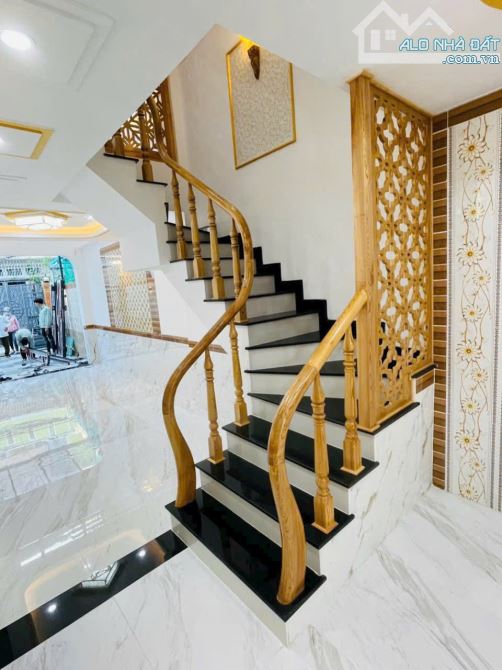 BÁN NHÀ 1 TRỆT 3 LẦU MỚI ĐẸP HẺM Ô TÔ NGUYỄN AN NINH - 2
