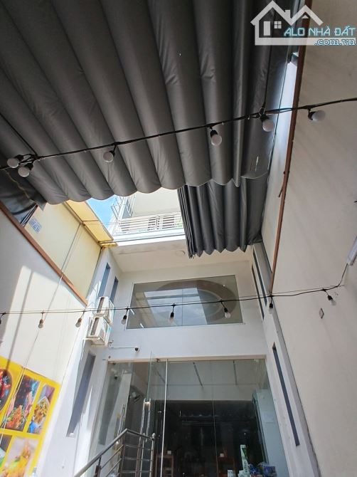 Bán tòa nhà CHDV 8 tầng mặt tiền Lê Văn Thọ, P.8, Gò Vấp dòng tiền 100tr/th 180m2 - Giá 31 - 2
