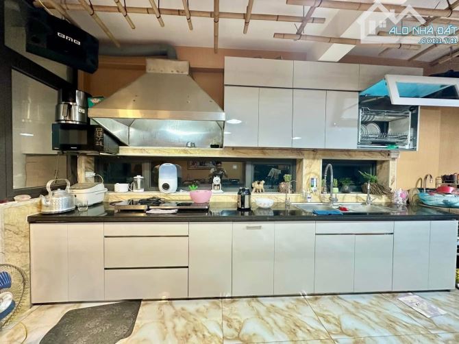 Nhà đẹp Tôn Đức Thắng quận Đống Đa 64m2 7Tầng MT5.5m-Ô Tô Tránh Thang Máy-10m Ra Hồ - 3