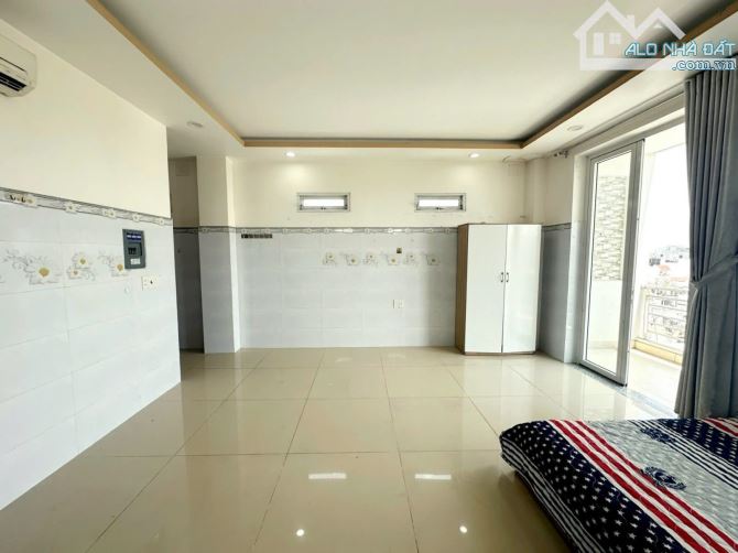 Bán tòa nhà CHDV 8 tầng mặt tiền Lê Văn Thọ, P.8, Gò Vấp dòng tiền 100tr/th 180m2 - Giá 31 - 5