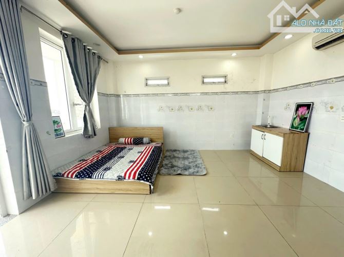 Bán tòa nhà CHDV 8 tầng mặt tiền Lê Văn Thọ, P.8, Gò Vấp dòng tiền 100tr/th 180m2 - Giá 31 - 7
