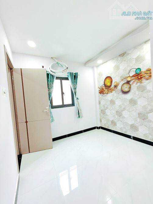 Bán nhà mới 2 lầu gần mặt tiền đường Cao Xuân Dục P.12 Quận 8 - 8