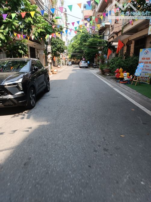 Phân Lô Ô Tô Tránh Trần Quang Diệu Đống Đa Lô Góc 7 Tầng Thang máy Ngõ Thông Gần Phố 23 Tỷ