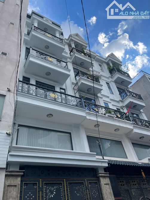 Dương Quảng Hàm Gò Vấp, hẻm xe hơi 8m, Dt 50m2, 5 tầng 4Pn, full nội thất, giảm còn 9,9 tỷ
